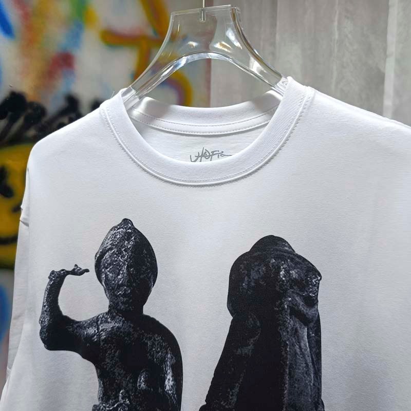 قمصان صيفية بيضاء من القطن الم - مراجعة Cactus Jack Tee وسعره